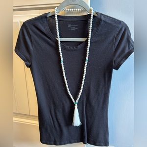 Long tassel beaded necklace with faux turquoise and gold accents